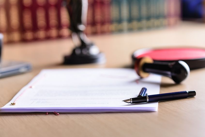 lamination.jpg9bd71fd5-6 Contract waiting for a notary public sign on desk.